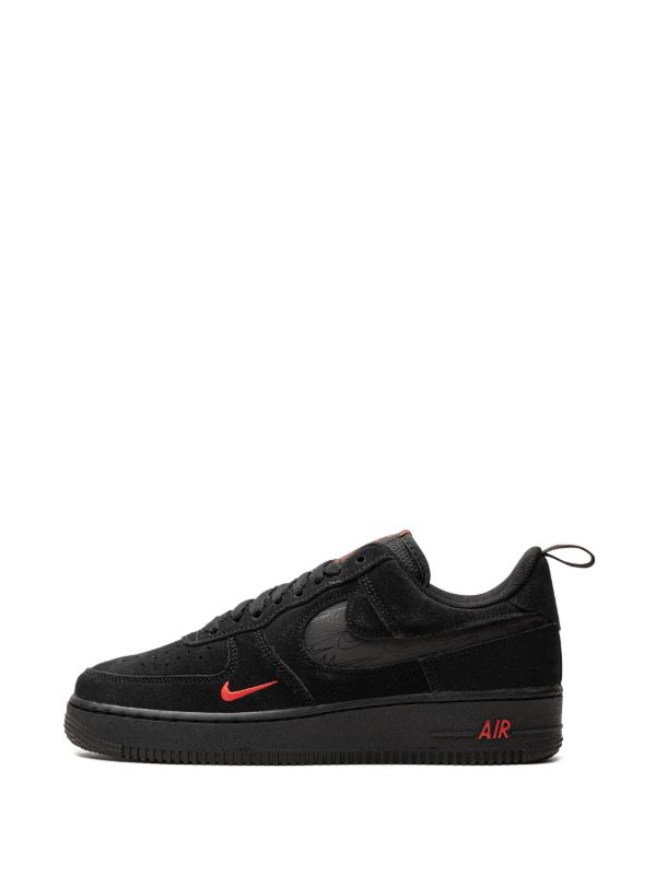 Nike Air Force 1 shoes featuring black and red
