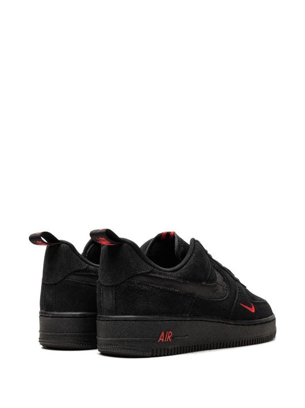 Nike Air Force 1 shoes featuring black and red