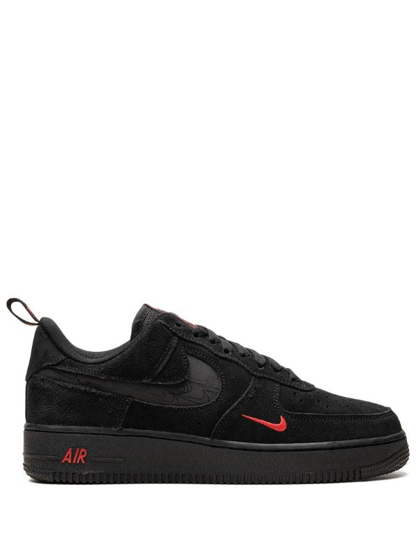 Nike Air Force 1 shoes featuring black and red