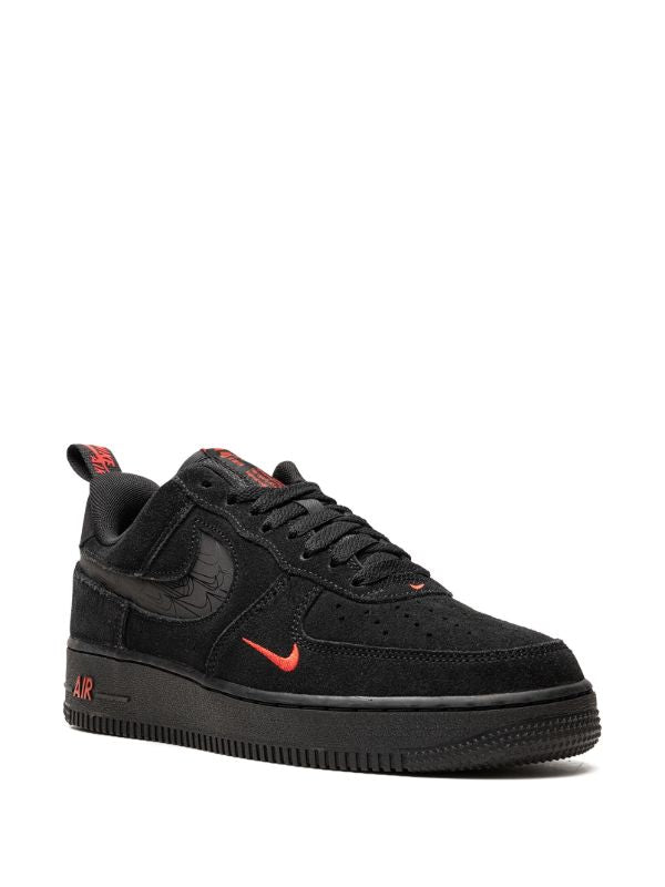 Nike Air Force 1 shoes featuring black and red